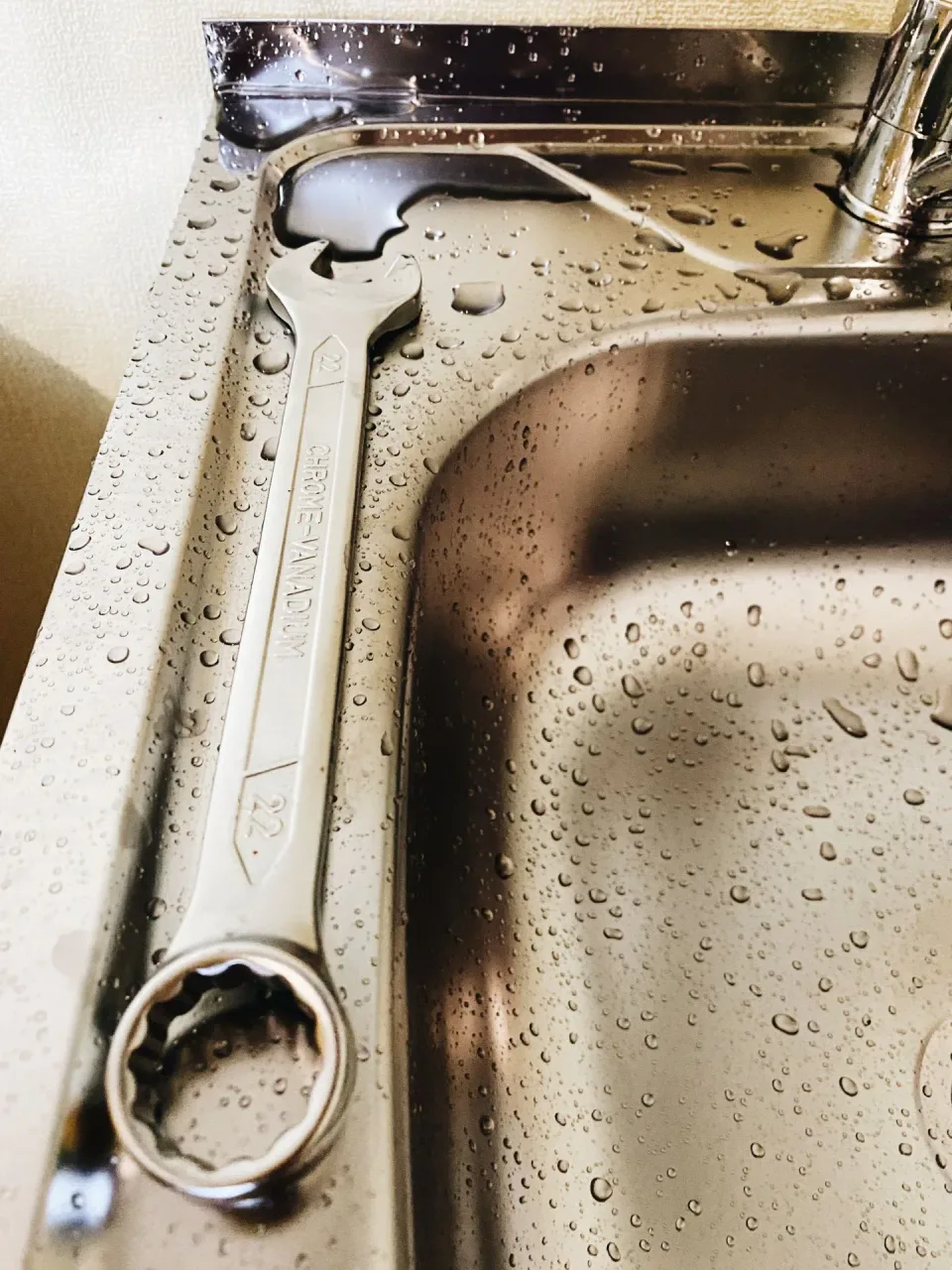 Wrench — Water Damage — Wrench, Stainless Steel Sink, Faucet, Water Damage, Plumbing